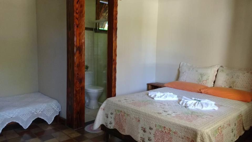 Postel nebo postele na pokoji v ubytování Pousada Aloes