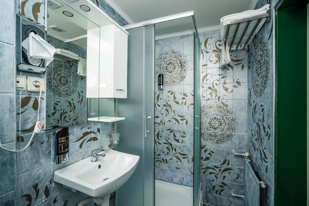 Koupelna v ubytování Hotel Czechia