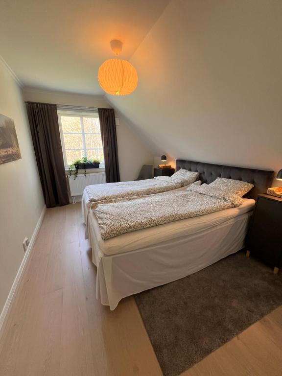 Postel nebo postele na pokoji v ubytování Newly built apartment in Höllviken
