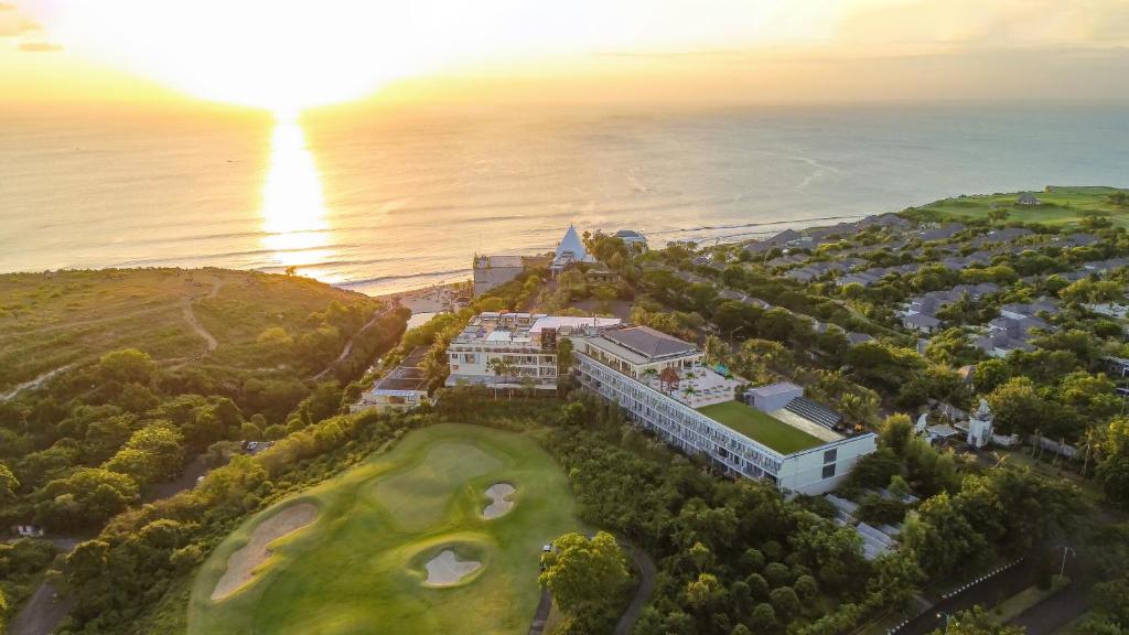 an aerial view of a resort and the ocean at Klapa Resort in Uluwatu
