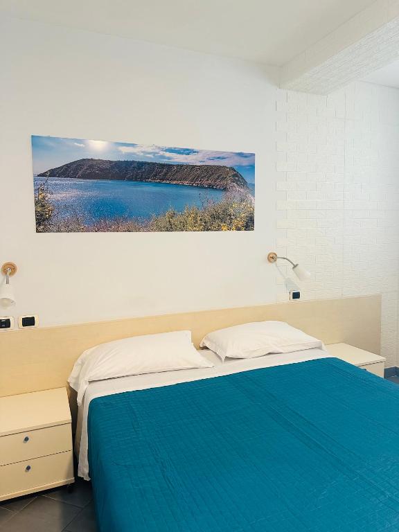 Postel nebo postele na pokoji v ubytování Lido Di Procida Guest House