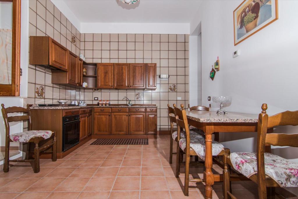 Kuchyň nebo kuchyňský kout v ubytování B&B Il Giardino Dei Mandarini
