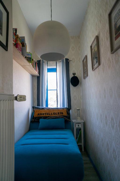 Postel nebo postele na pokoji v ubytování Ferienwohnung Bahnhof Wendehausen