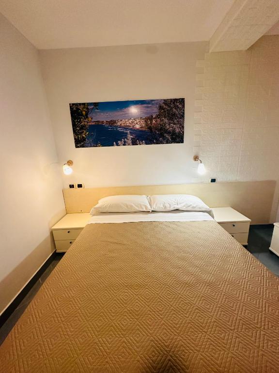 Postel nebo postele na pokoji v ubytování Lido Di Procida Guest House