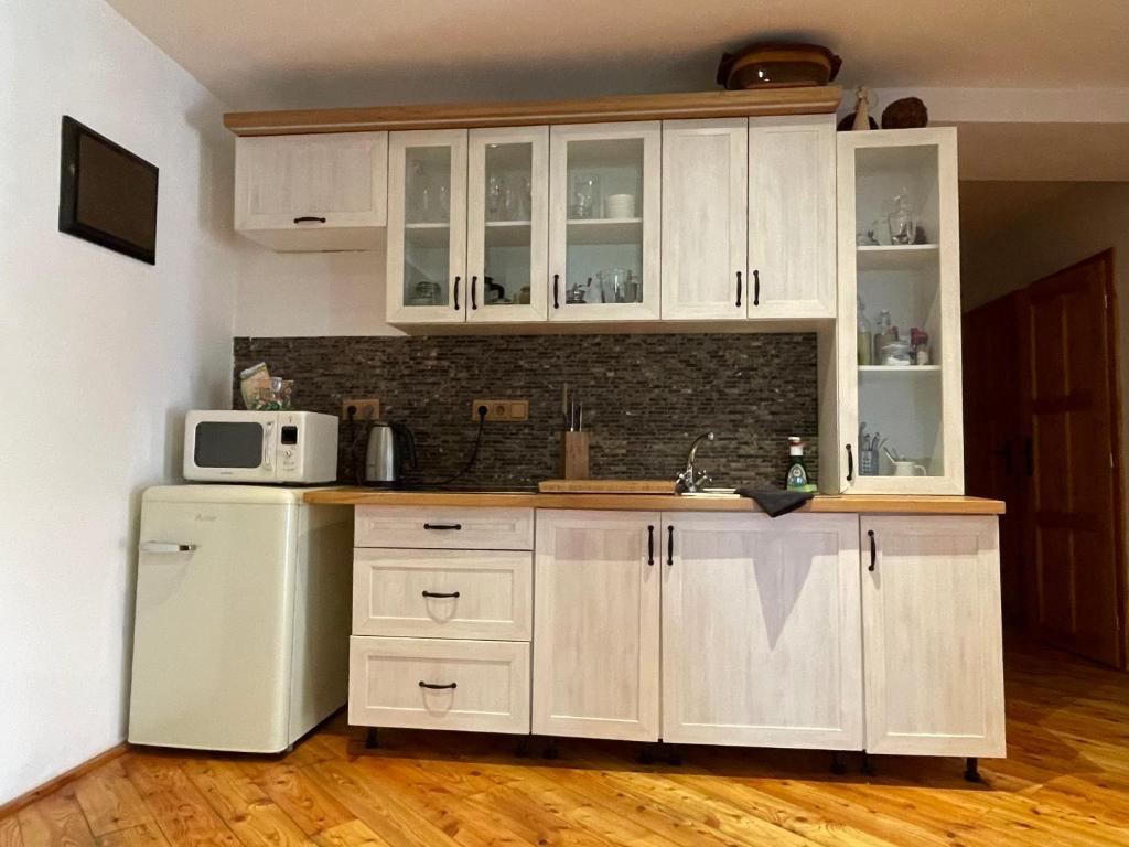 Kuchyň nebo kuchyňský kout v ubytování Wintermill