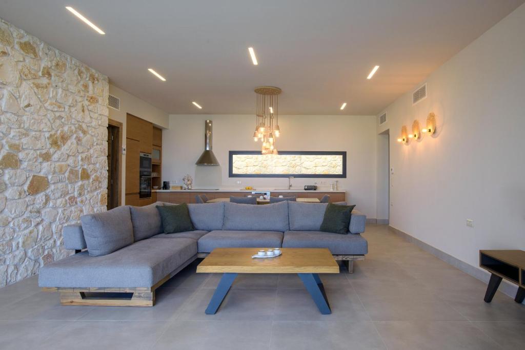 A seating area at Villa Otter by PosarelliVillas