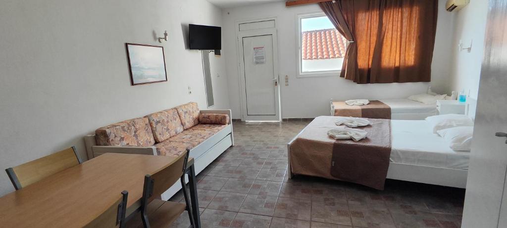 Postel nebo postele na pokoji v ubytování Amaranthos Skiathos View