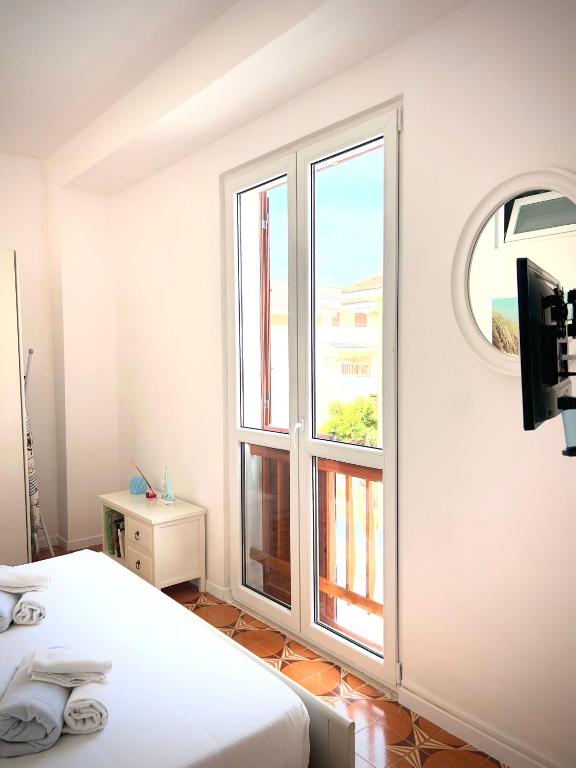 Postel nebo postele na pokoji v ubytování La casa di Vicky