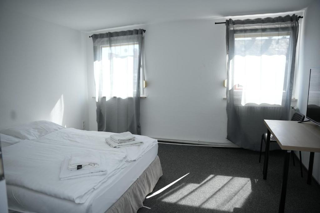 Postel nebo postele na pokoji v ubytování Ring Hotel