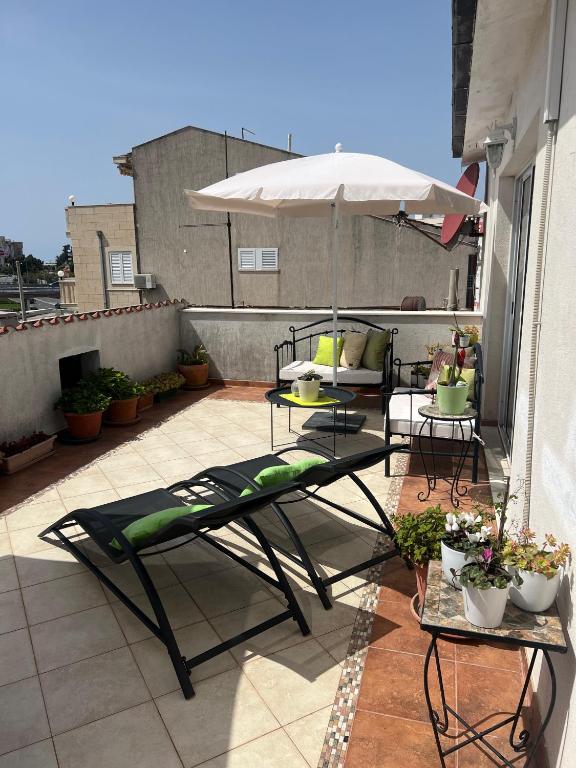Balkón alebo terasa v ubytovaní Apartment Svagi Rooftop