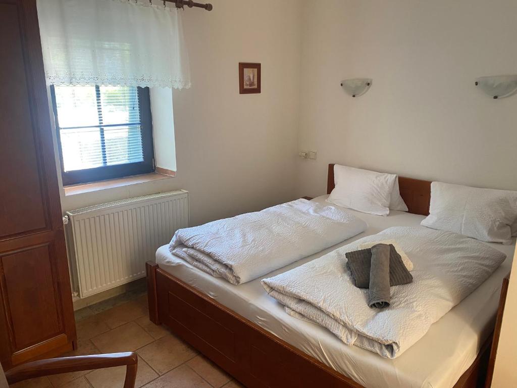 Postel nebo postele na pokoji v ubytování Penzion Janata