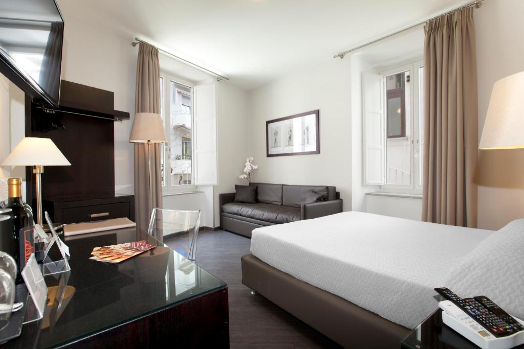 A bed or beds in a room at Magi House Relais