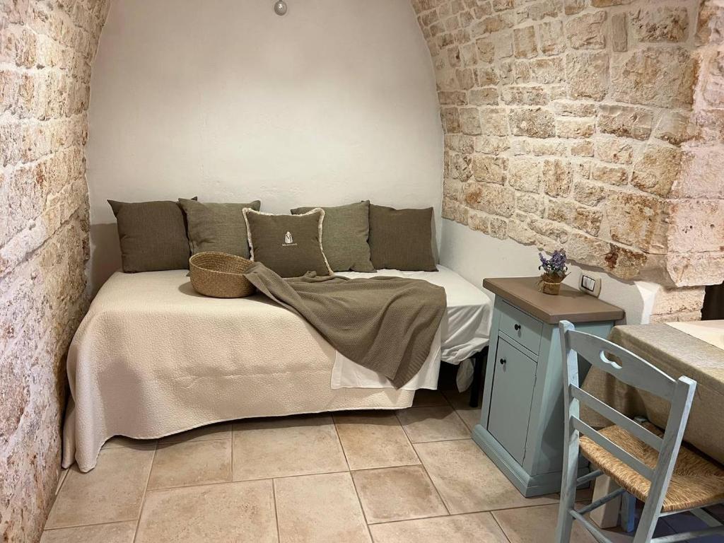 A bed or beds in a room at MILESTONES FAMILY SUITE - Rione Monti
