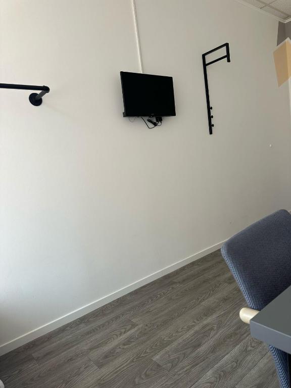 TV a/nebo společenská místnost v ubytování HH Hostels