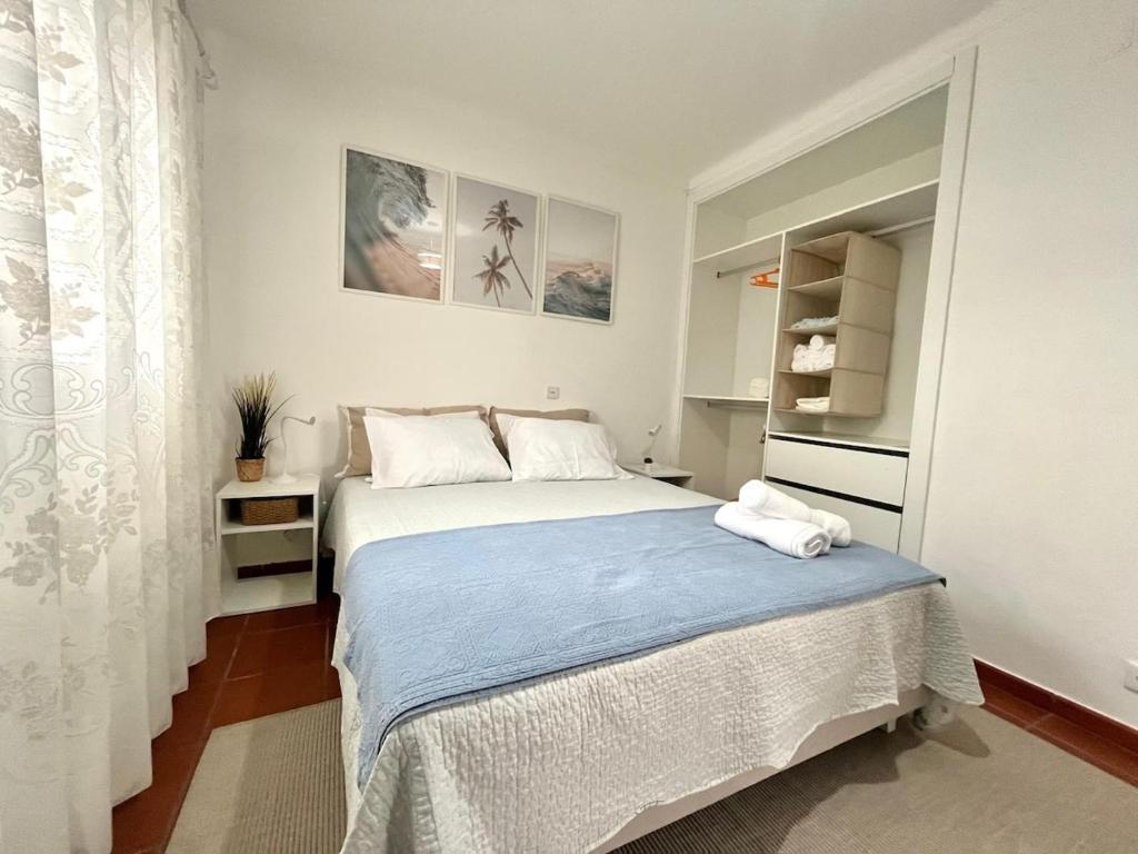 En eller flere senge i et værelse på VillaMar - Praia da Areia Branca