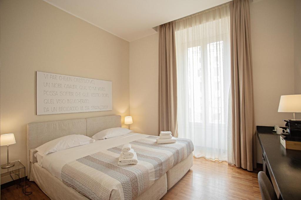 Uma cama ou camas num quarto em OperaDreams2