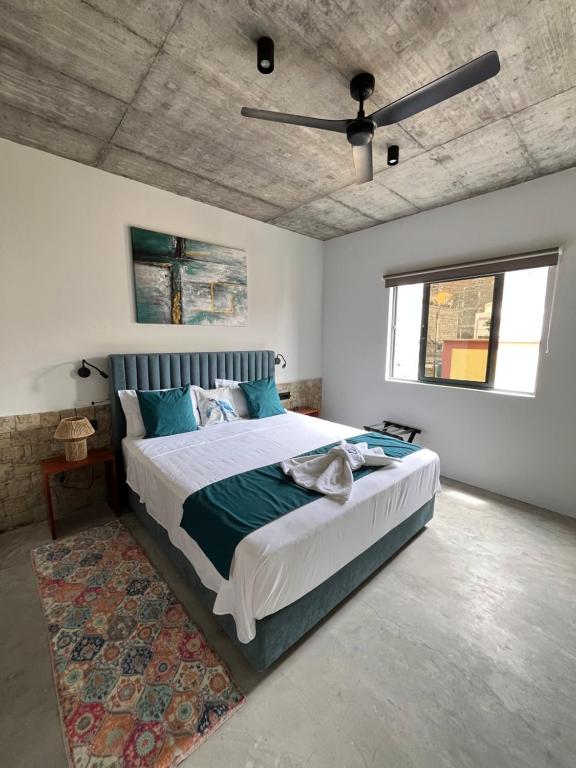 Postel nebo postele na pokoji v ubytování Boutique Hotel Luz da Lua