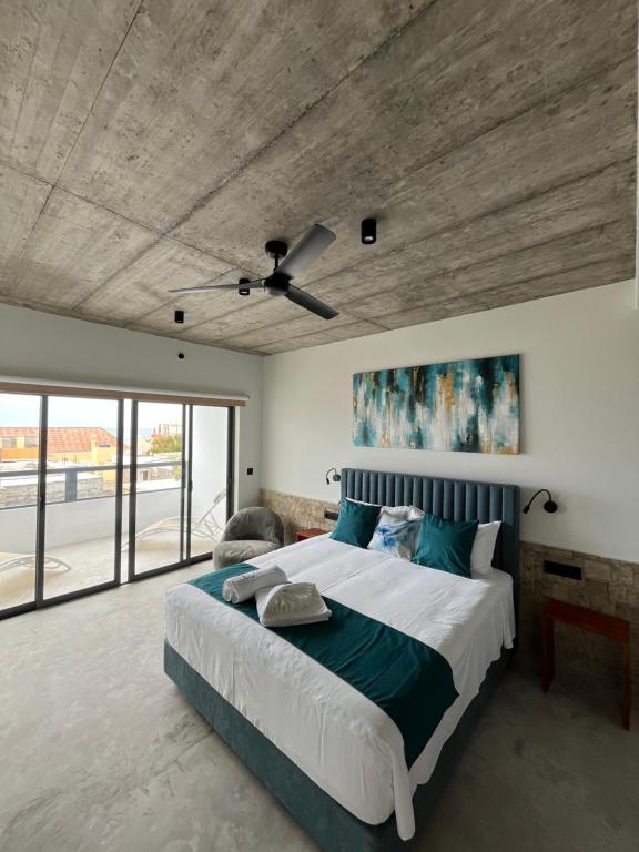 Postel nebo postele na pokoji v ubytování Boutique Hotel Luz da Lua