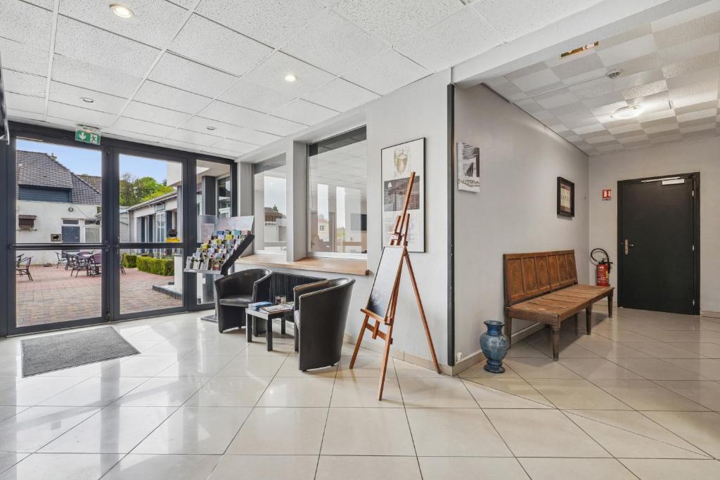 Posezení v ubytování Hôtel Restaurant AKENA Camiers-Le Touquet - 2 étoiles