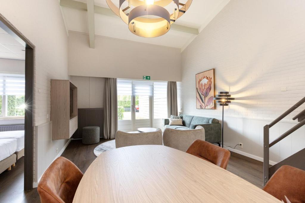 Een zitgedeelte bij Aparthotel Delden