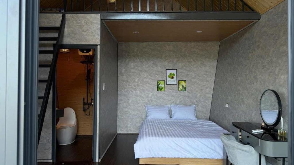 Postel nebo postele na pokoji v ubytování Homestay Linh Thuỷ