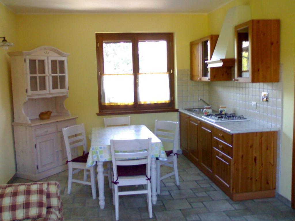 Kuchyň nebo kuchyňský kout v ubytování AGRITURISMO Casa Riz