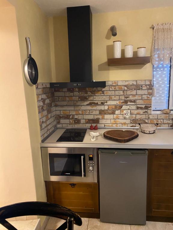 Kuchyň nebo kuchyňský kout v ubytování Avas studios