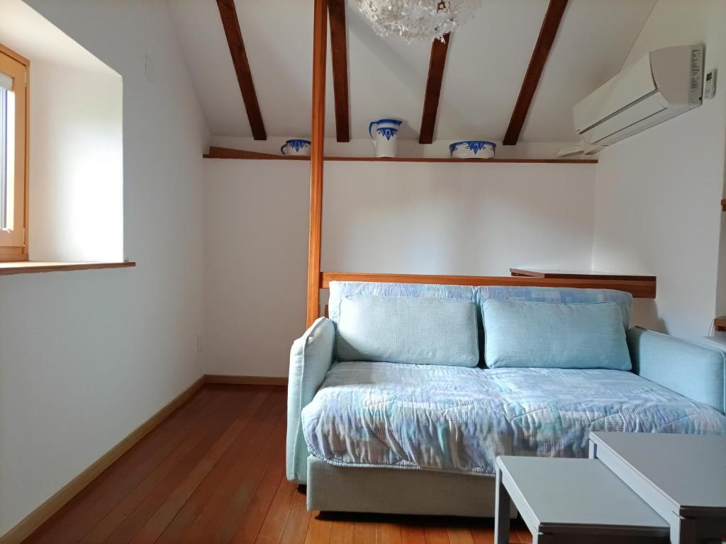 Postel nebo postele na pokoji v ubytování Rustico "Casa di Sasso"