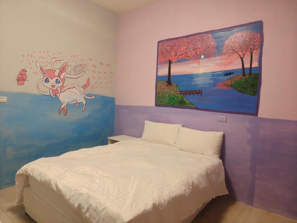 Postel nebo postele na pokoji v ubytování Xinyuanbao Shangshi Homestay