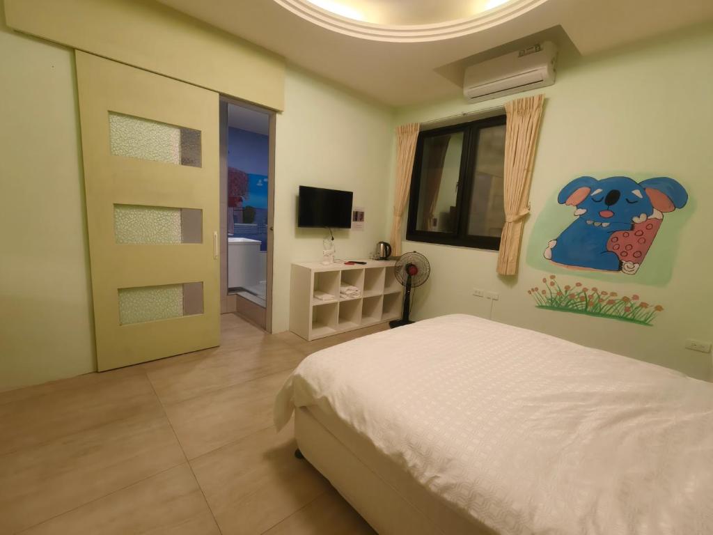 Postel nebo postele na pokoji v ubytování Xinyuanbao Shangshi Homestay