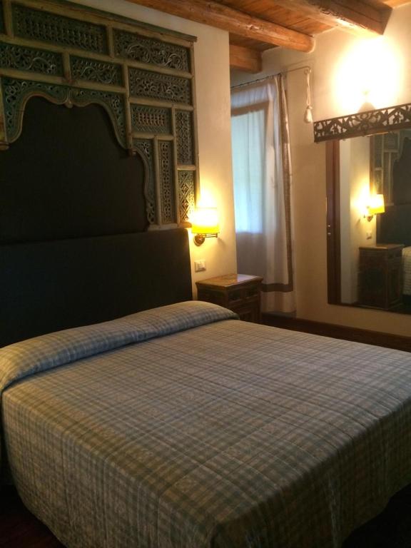 Postel nebo postele na pokoji v ubytování BED & BREAKFAST Orizzonte