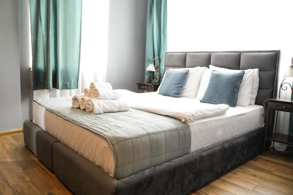 Postel nebo postele na pokoji v ubytování Hotel Dum by Muskat