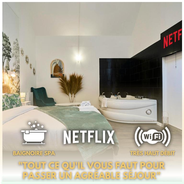 une chambre d'hôtel avec un lit et une baignoire dans l'établissement NG Prestige - Balnéo - TV - Netflix - WIFI - Cour, à Roubaix