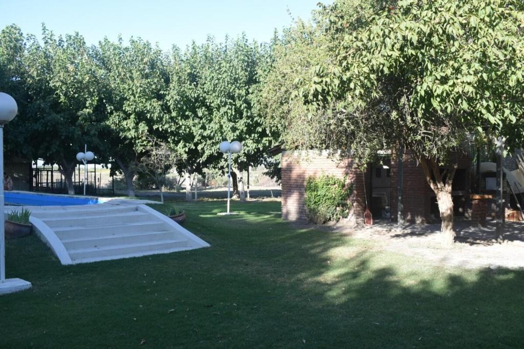 a picnic table in a yard with trees at Casa quinta soñada! in Pocito
