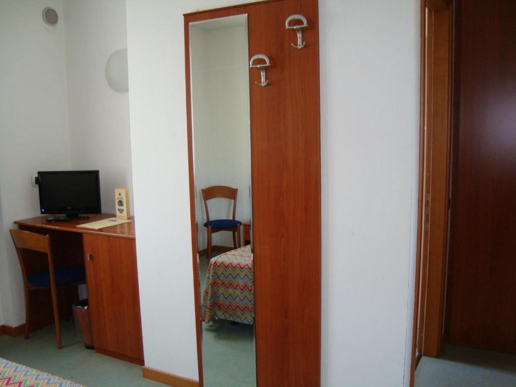 TV a/nebo společenská místnost v ubytování Hotel Naonis
