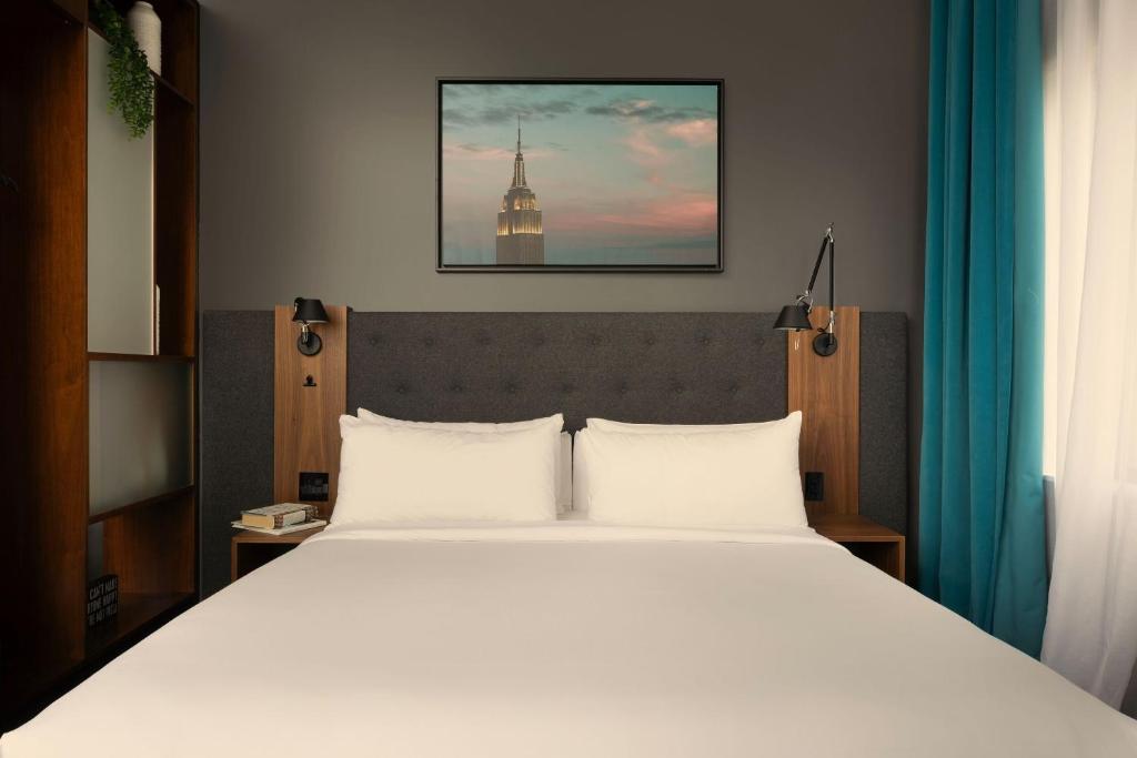 Ein Bett oder Betten in einem Zimmer der Unterkunft The Cloud One New York-Downtown, by the Motel One Group