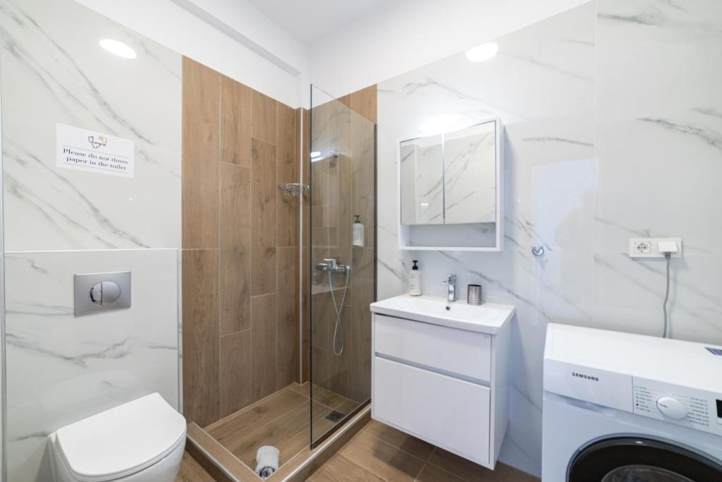 Koupelna v ubytování Argilos & Argilos Deluxe Residential Complexes