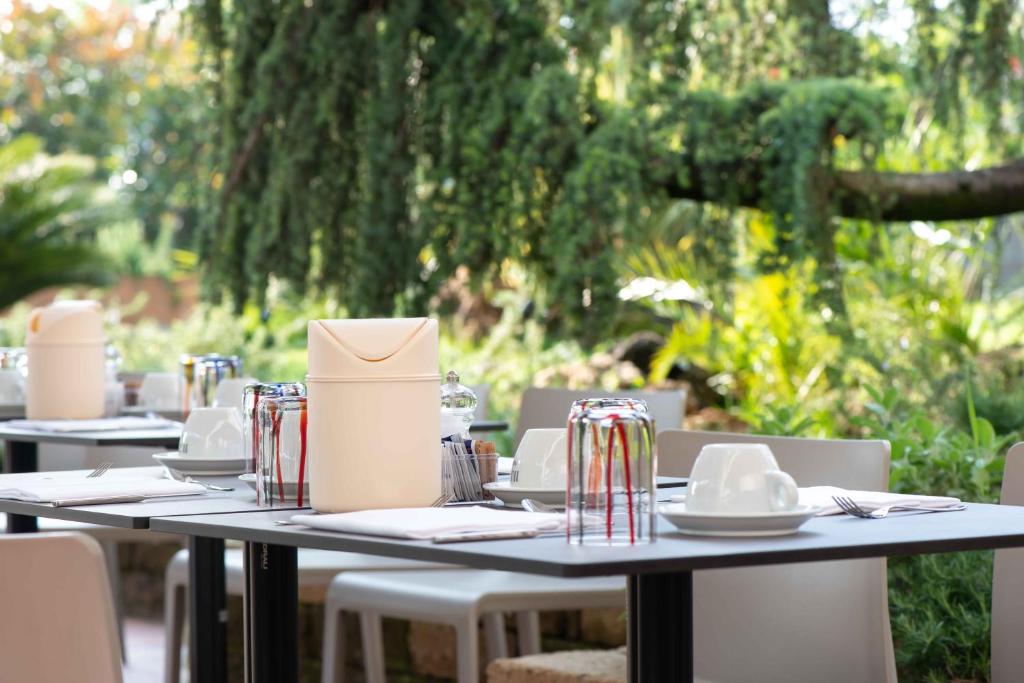 Een tuin van Alevic Hotel Sirmione