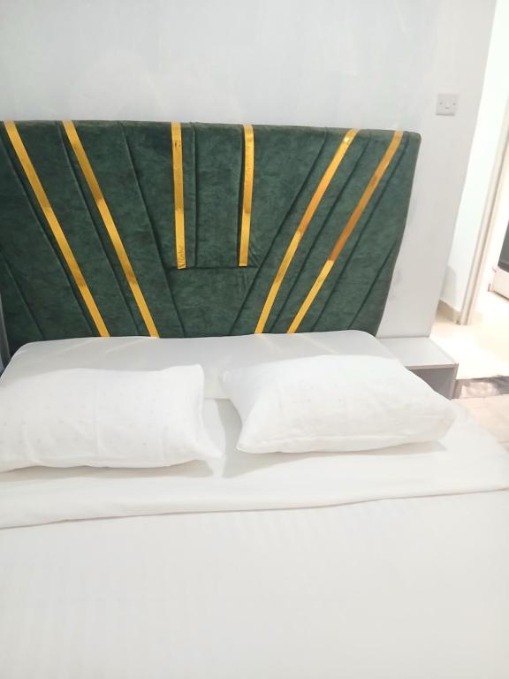 Postel nebo postele na pokoji v ubytování JjHomes