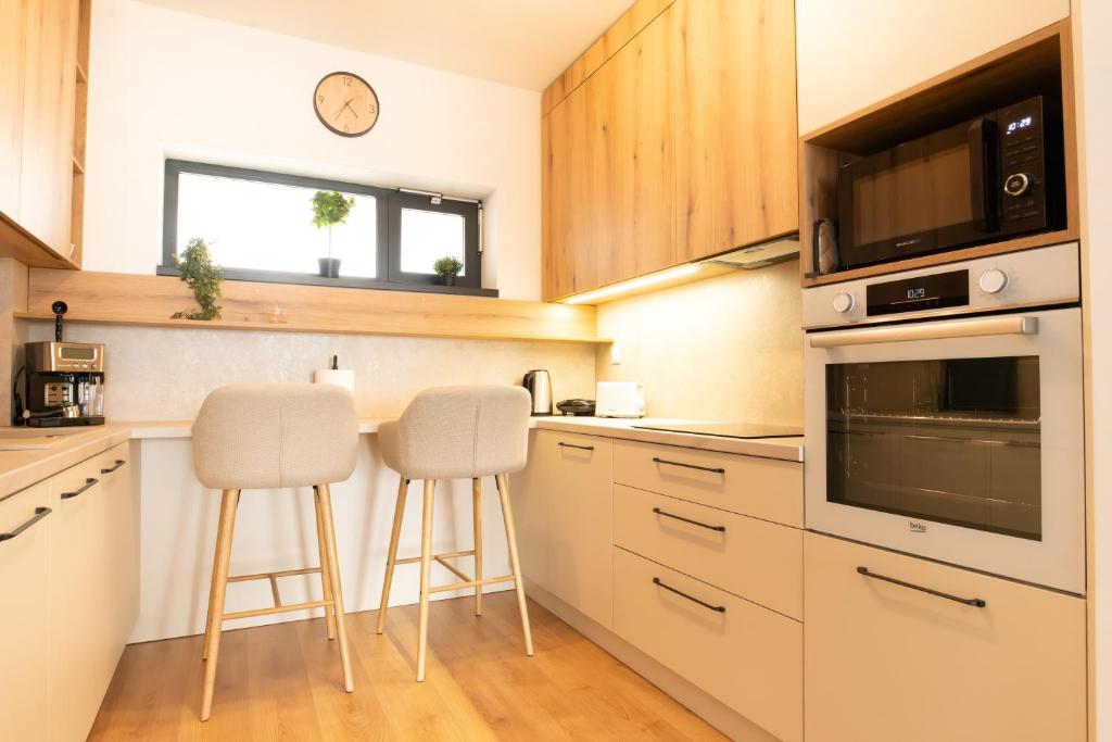 Kuchyň nebo kuchyňský kout v ubytování ONL Apartments