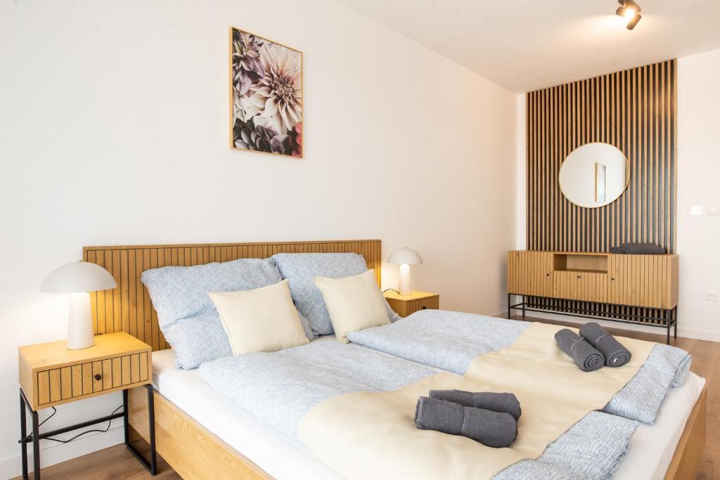 Postel nebo postele na pokoji v ubytování ONL Apartments