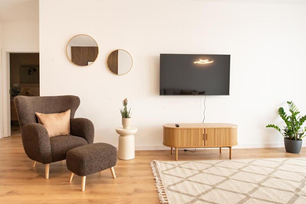 TV a/nebo společenská místnost v ubytování ONL Apartments