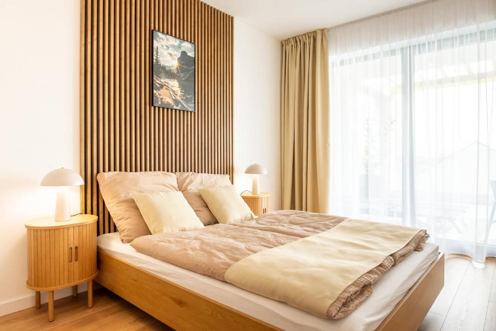 Postel nebo postele na pokoji v ubytování ONL Apartments