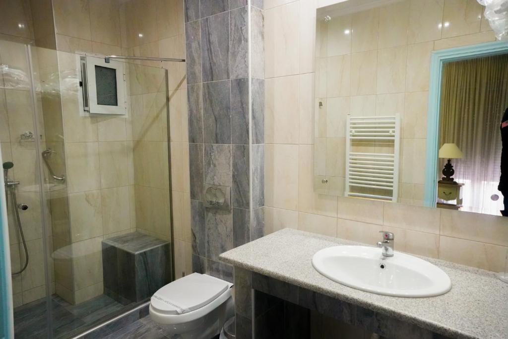Koupelna v ubytování Hotel Marianna