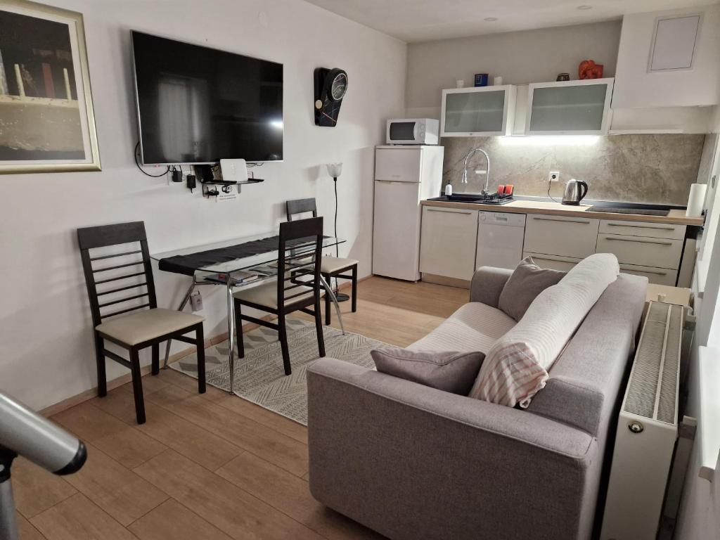 Kuchyňa alebo kuchynka v ubytovaní Studio Sweet Home