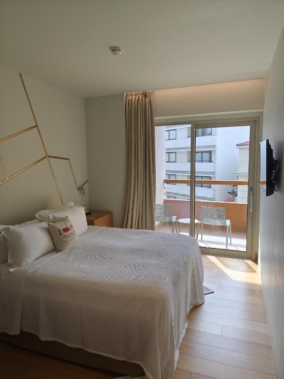 Postel nebo postele na pokoji v ubytování Coco-mat Athens BC