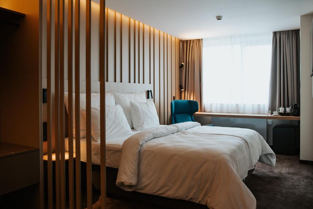 OREA Hotel Pyramida Praha客房内的一张或多张床位