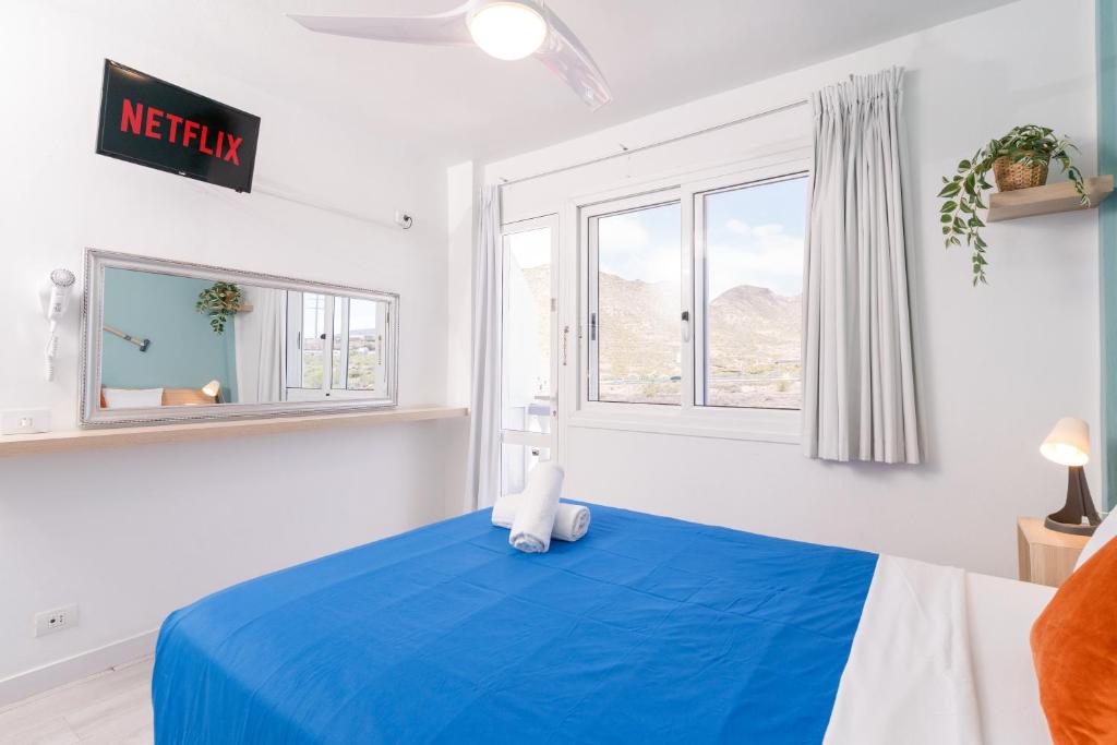Postel nebo postele na pokoji v ubytování Hostel Neon Tenerife