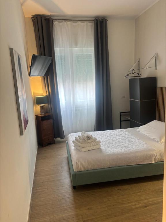 Łóżko lub łóżka w pokoju w obiekcie PVrooms