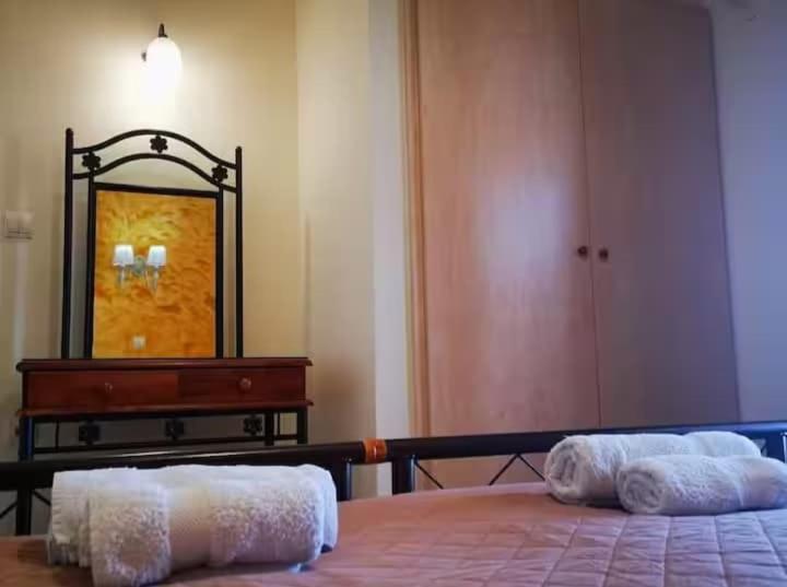 Postel nebo postele na pokoji v ubytování Iridis R & R